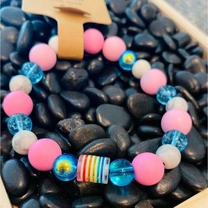 Bracelet-Transgender Love, plastic and matte beads with a LGBTQ center bead 7.5”